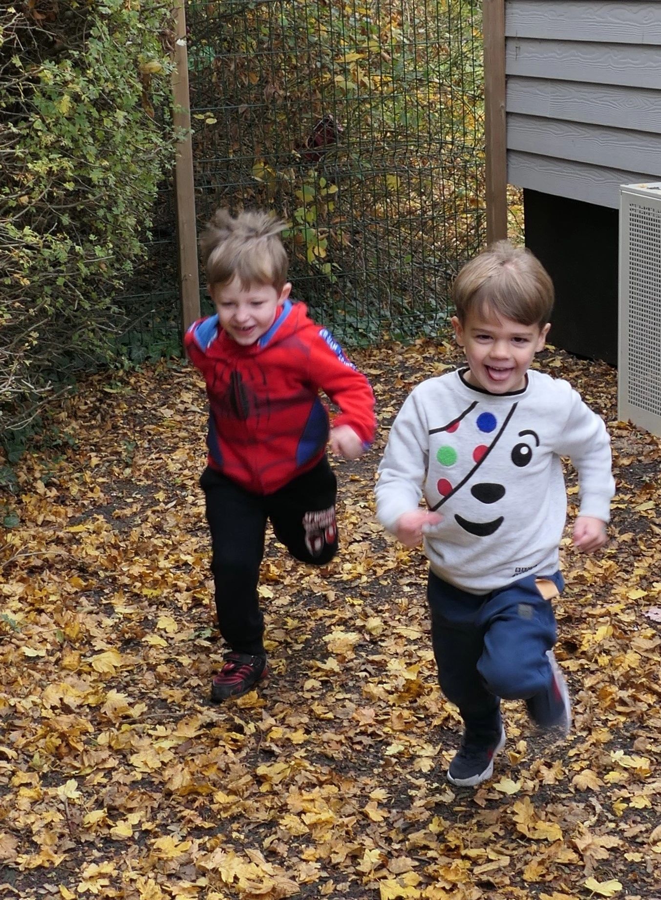 Children playing outdoors at Little Chums Nursery